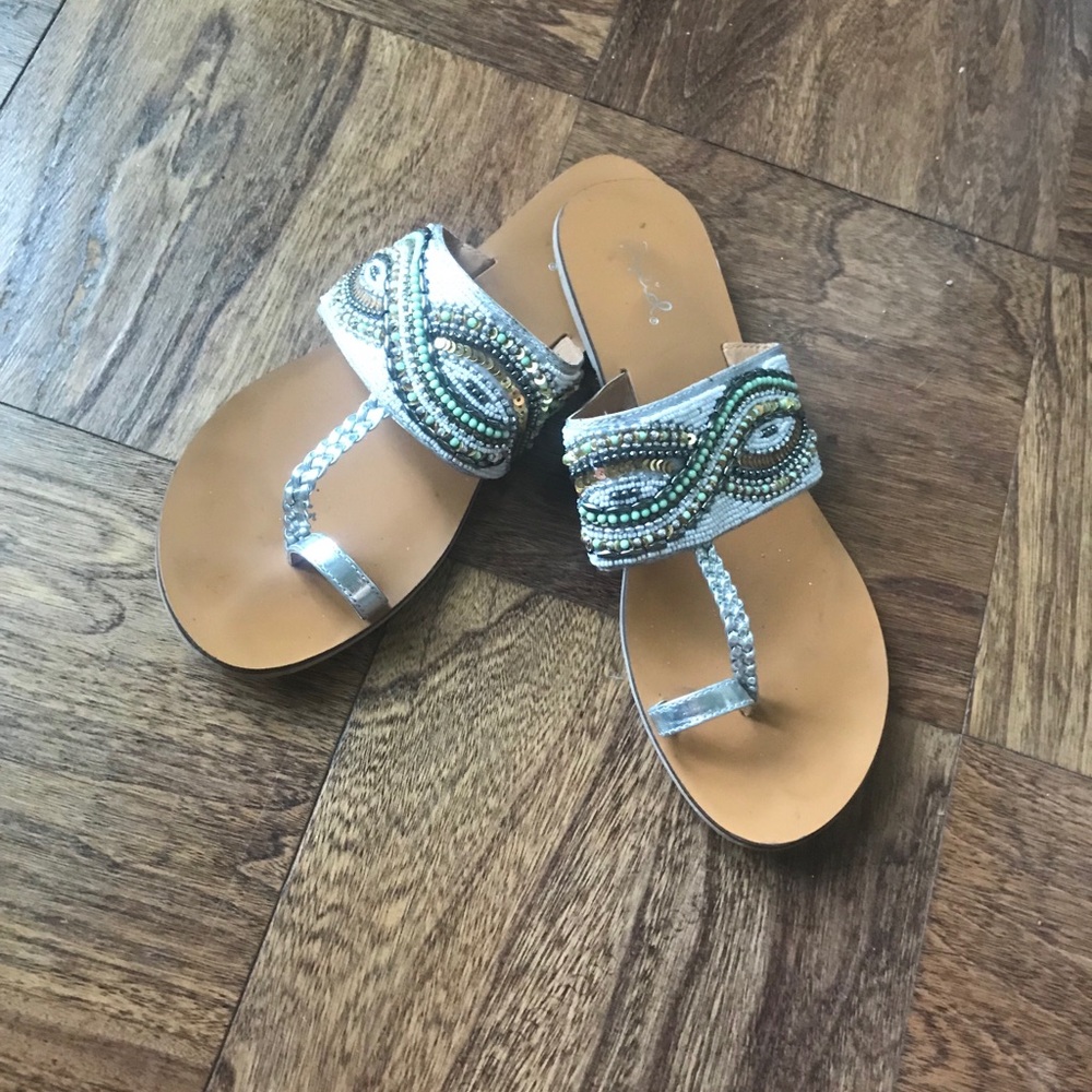 Beaded sandals.